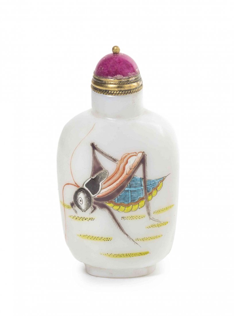 A Peking Glass Snuff Bottle, Height 2 1/2 inches.: A Peking Glass Snuff Bottle, of compressed flask form, having a painted enamel cricket on a milky white ground to both sides, with Gu Yue Xuan mark painted to the underside. Height 2 1/2 inches.