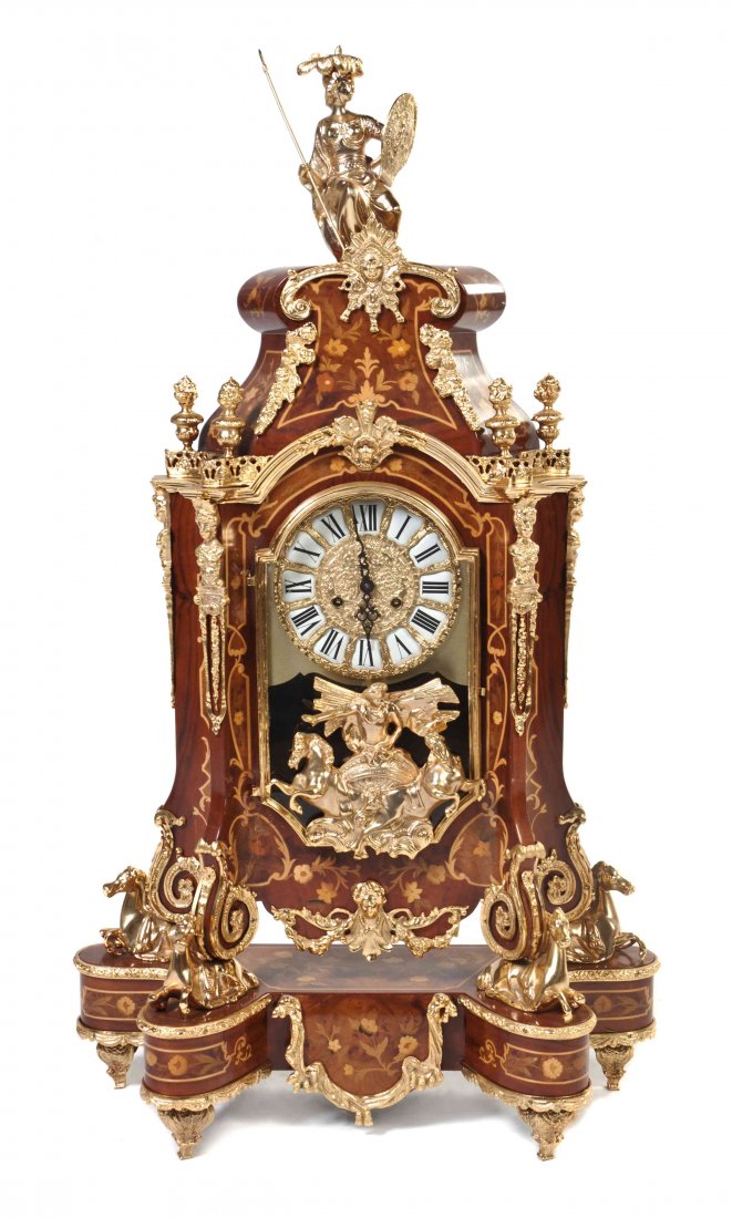 A Continental Marquetry and Gilt Bronze Mounted Bracket: A Continental Marquetry and Gilt Bronze Mounted Bracket Clock, surmounted by a figure of Athena with a shield and spear over the segmented enameled dial with Roman hours, further set with a figure of 