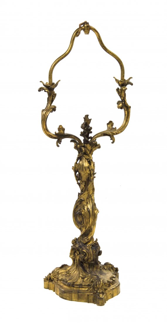 A Louis XV Style Gilt Bronze Lamp Base, Robert, Height: A Louis XV Style Gilt Bronze Lamp Base, Robert, having a foliate cast harp, standard and tripartite base, signed Robert Es Sculp. with circular Susse Freres foundry mark. Height 30 1/4 inches.