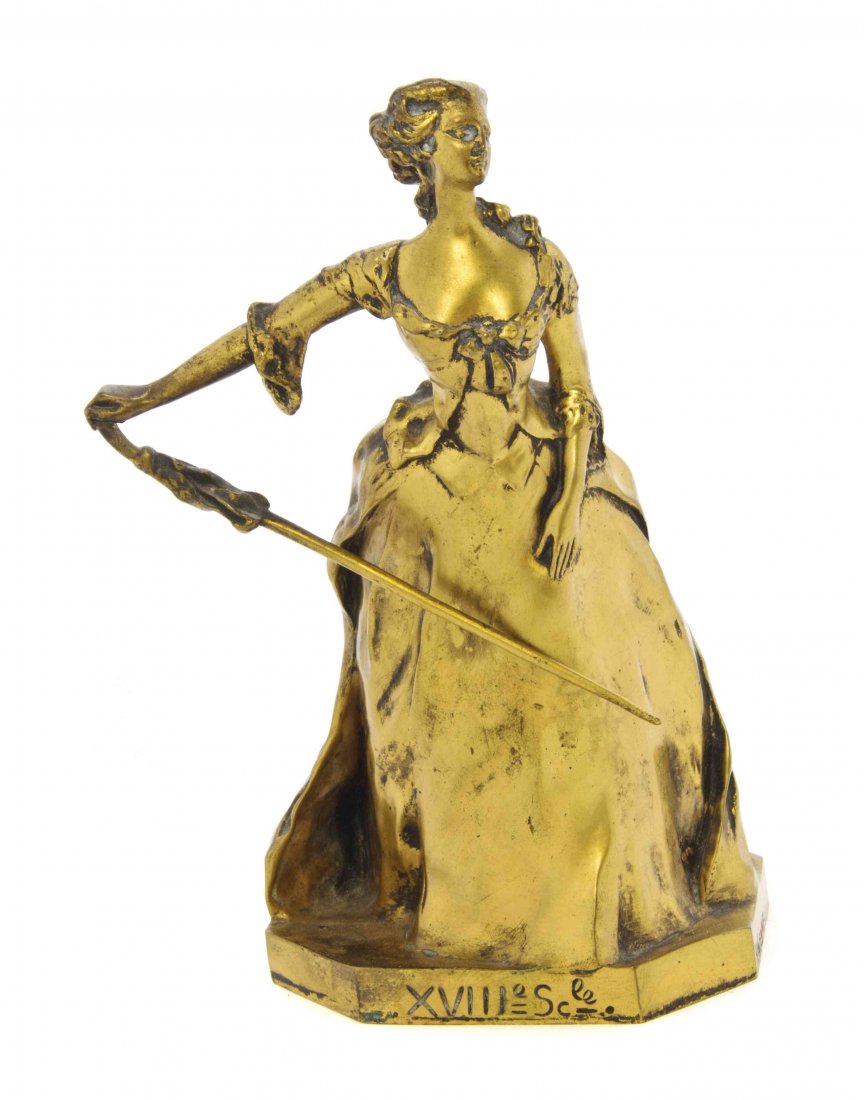 A French Gilt Bronze Figure, Henri Varenne (1860-1933),: A French Gilt Bronze Figure, Henri Varenne (1860-1933), depicting a lady holding a closed parasol, with Susse Freres foundry mark. Height 7 1/8 inches. Property from the Collection of a Lady, Oak Broo