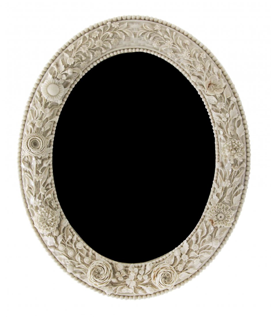 A Belleek Flowered Mirror, Height 15 3/4 x width 13: A Belleek Flowered Mirror, 1891-1926, the oval basket weave and beaded frame further applied with various species of flowers, with second black Belleek mark to verso. Height 15 3/4 x width 13 inches.