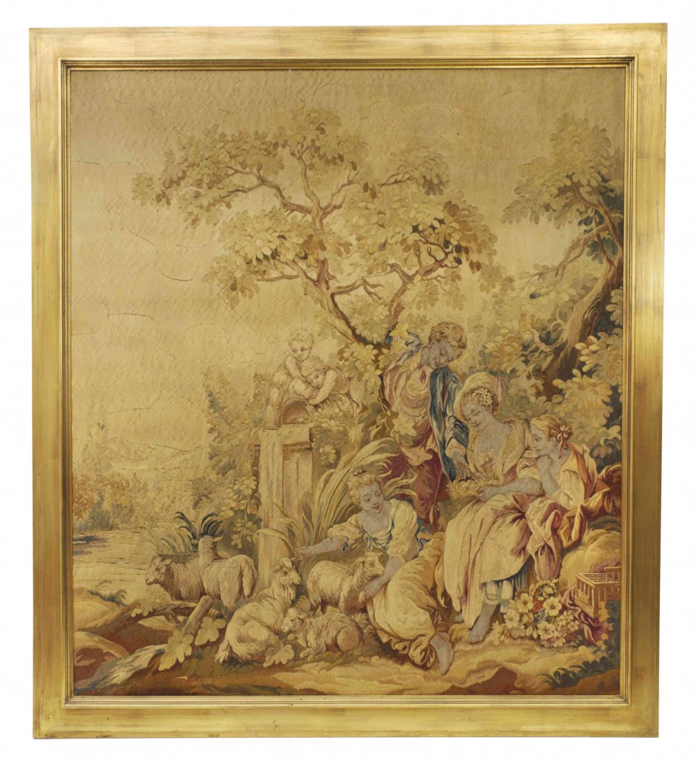 An Aubusson Wool Tapestry, Height 50 3/4 x width 44 3/4: An Aubusson Wool Tapestry, depicting three maidens and a gentleman sitting beneath a leafy tree among animals, set in a later giltwood frame. Height 50 3/4 x width 44 3/4 inches. Property from the Col