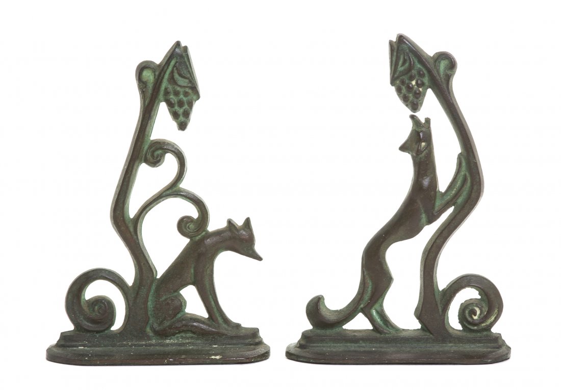 A Pair of American Patinated Bronze Figural Bookends,: A Pair of American Patinated Bronze Figural Bookends, William Boogar (1893-1958), depicting Aesop's Fable The Fox and the Grapes, raised on a shaped rectangular base, each signed Boogar. Height of tal
