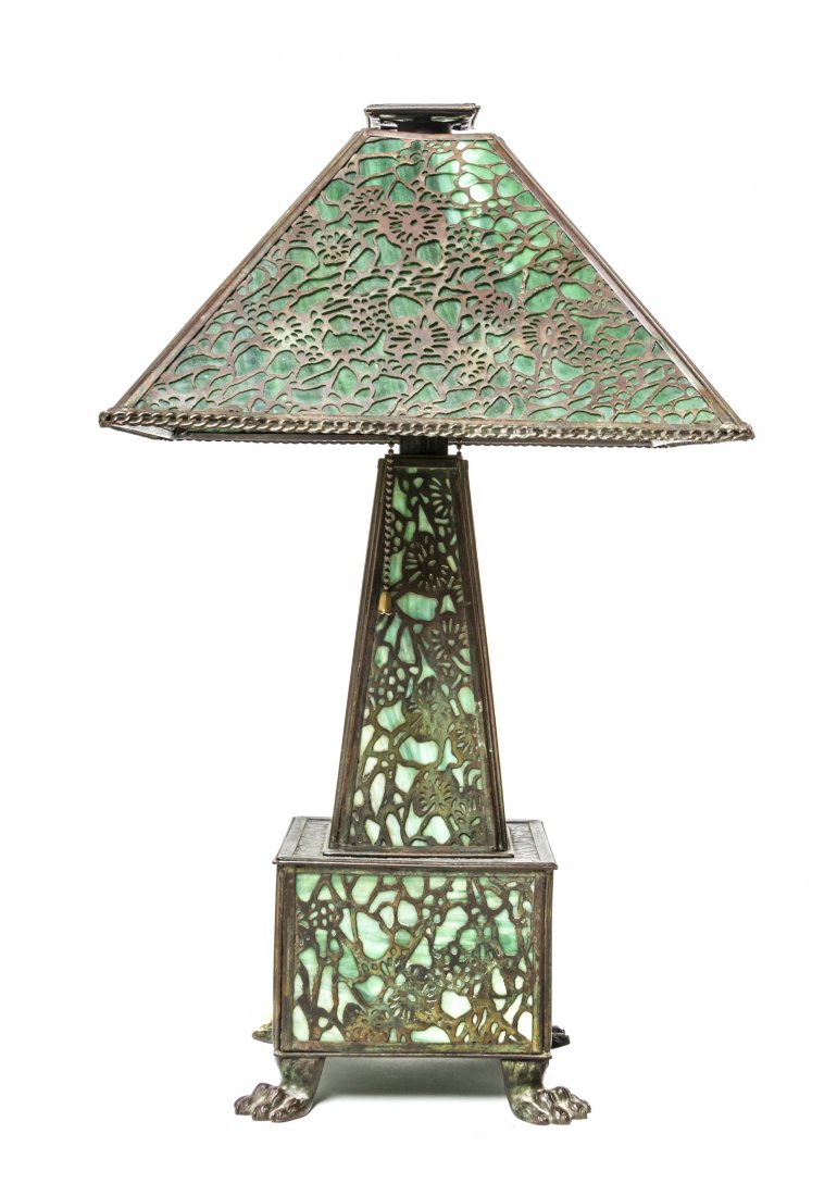 An American Slag Glass Table Lamp, attributed to Apollo: An American Slag Glass Table Lamp, attributed to Apollo Studios, in the Pine Cone pattern, the shade of conical form over a tapering standard, raised on a square base ending in paw feet. Diameter of s