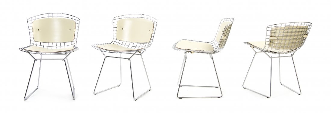 Four Harry Bertoia Wire Chairs, (Italian, 1915-1978): Four Harry Bertoia Wire Chairs, (Italian, 1915-1978) for Knoll, each having a wire back and seat, with attached cushions. Height 28 3/4 inches.