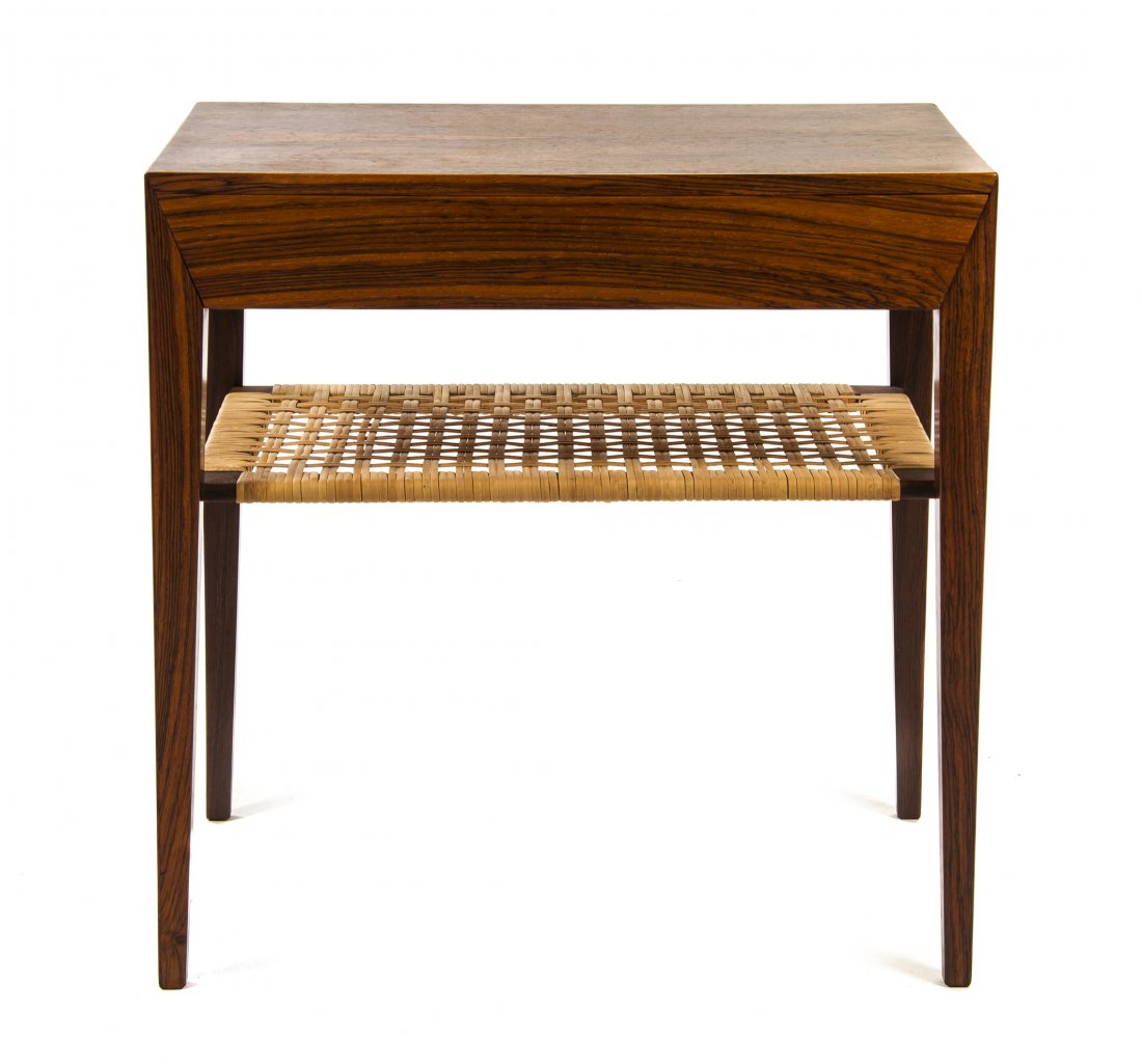 A Danish Rosewood Occasional Table, Severin Hansen,: A Danish Rosewood Occasional Table, Severin Hansen, having a rectangular top over a long drawer, raised on tapering legs joined by a rattan medial shelf, bearing partial Danish control label. Height 1