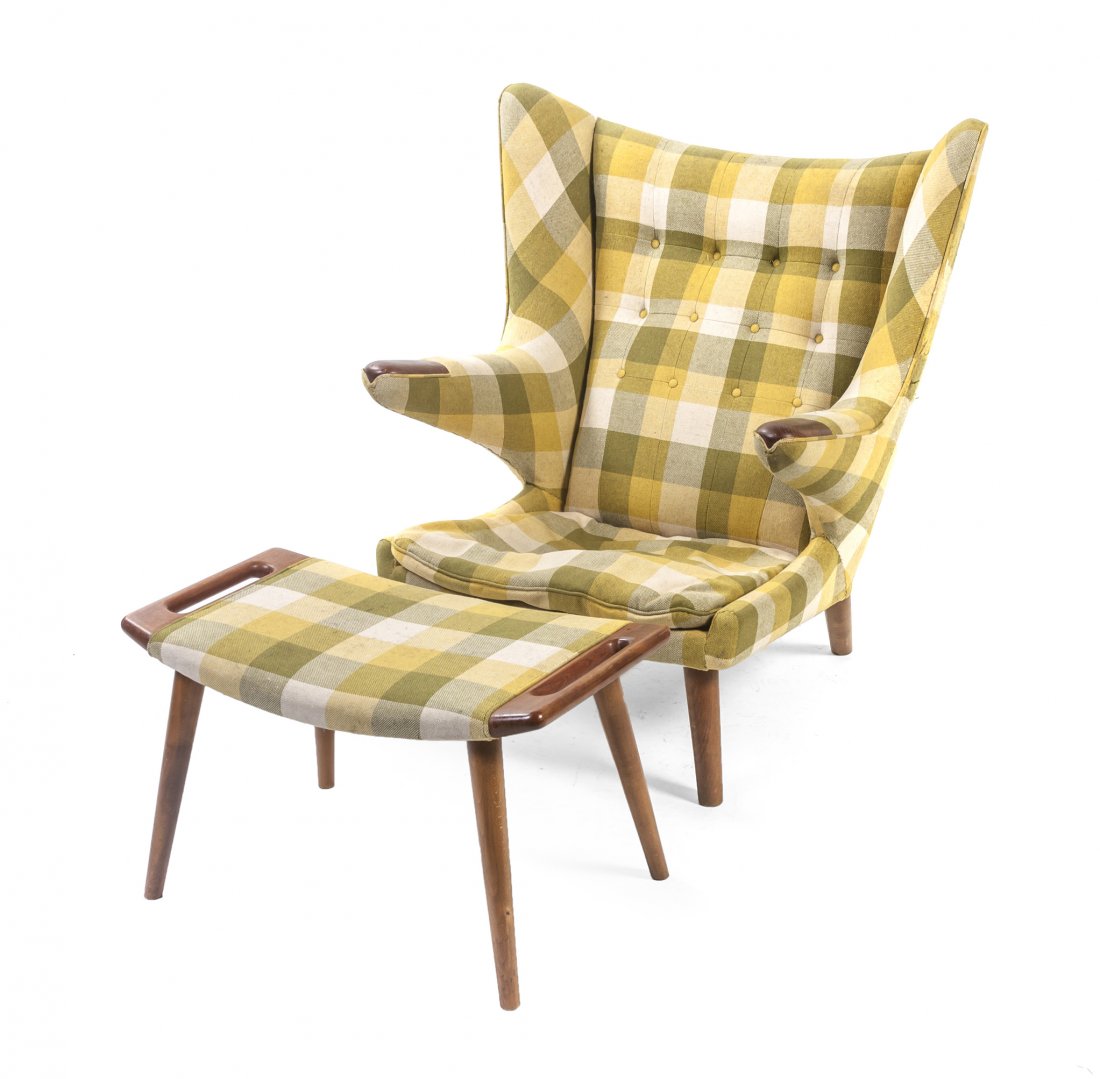 A Hans Wegner Teak Papa Bear Chair and Ottoman,: A Hans Wegner Teak Papa Bear Chair and Ottoman, (Danish, 1914-2007), having an upholstered tufted back, arms and seat, with exposed hand rests, raised on tapering cylindrical legs, the ottoman upholst
