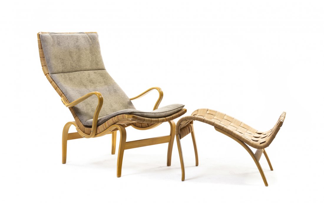 A Bruno Mathsson Beech Pernilla 2 Chair and Ottoman,: A Bruno Mathsson Beech Pernilla 2 Chair and Ottoman, (Swedish, 1907-1988), having a woven back and seat, raised on curved legs joined by stretchers, each signed Bruno Mathsson, the ottoman further sta