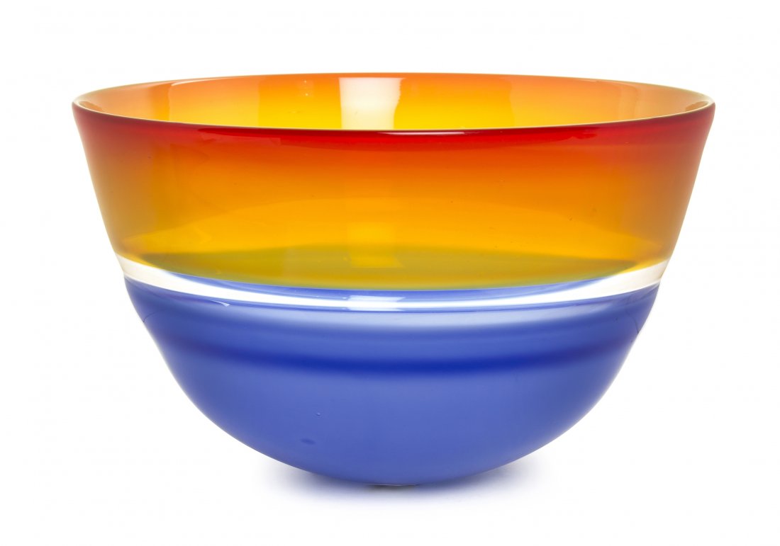 An American Blown Glass Vase, Sonja Blomdahl (b. 1952),: An American Blown Glass Vase, Sonja Blomdahl (b. 1952), of tapering form with a red, yellow and blue ground, signed and numbered SB4183. Diameter 12 1/8 inches.