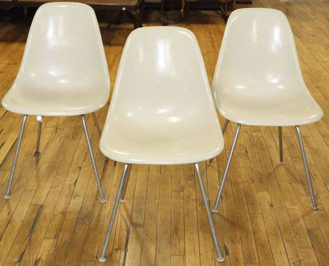 A Group of Six Charles and Ray Eames Chairs, Height 31: A Group of Six Charles and Ray Eames Chairs, white and raised on tubular legs. Height 31 inches. Property from the Collection of the Milwaukee Public Library, Milwaukee Wisconsin