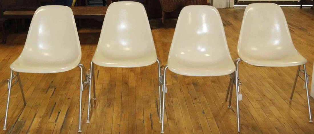 A Group of Eight Charles and Ray Eames Chairs, Height: A Group of Eight Charles and Ray Eames Chairs, white and raised on tubular legs. Height 31 inches. Property from the Collection of the Milwaukee Public Library, Milwaukee Wisconsin