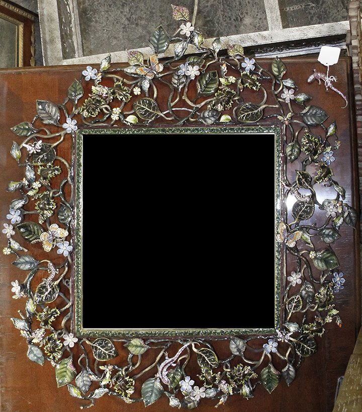 A Jay Strongwater Wall Mirror, Height 33 x width 28: A Jay Strongwater Wall Mirror, having scrolling foliate, floral and amphibian decoration. Height 33 x width 28 inches (overall). Property from the Estate of Louis M. and Linda M. Byron, Tucson, Arizon
