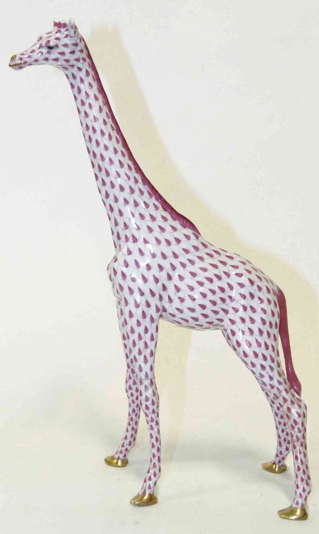 A Herend Porcelain Giraffe, Height 14 1/2 inches.: A Herend Porcelain Giraffe, with gilt highlights and fishnet decoration throughout. Height 14 1/2 inches. Property from the Estate of Louis M. and Linda M. Byron, Tucson, Arizona