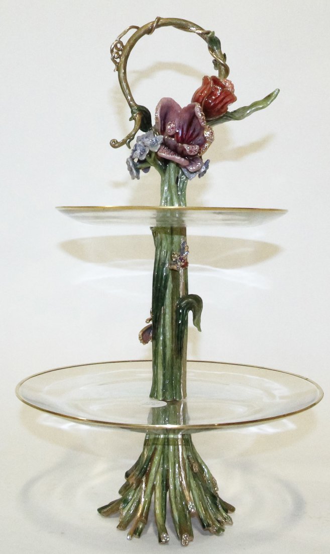 A Jay Strongwater Tiered Tray, Height 18 1/2 inches.: A Jay Strongwater Tiered Tray, having a floral standard with two glass tiers. Height 18 1/2 inches. Property from the Estate of Louis M. and Linda M. Byron, Tucson, Arizona