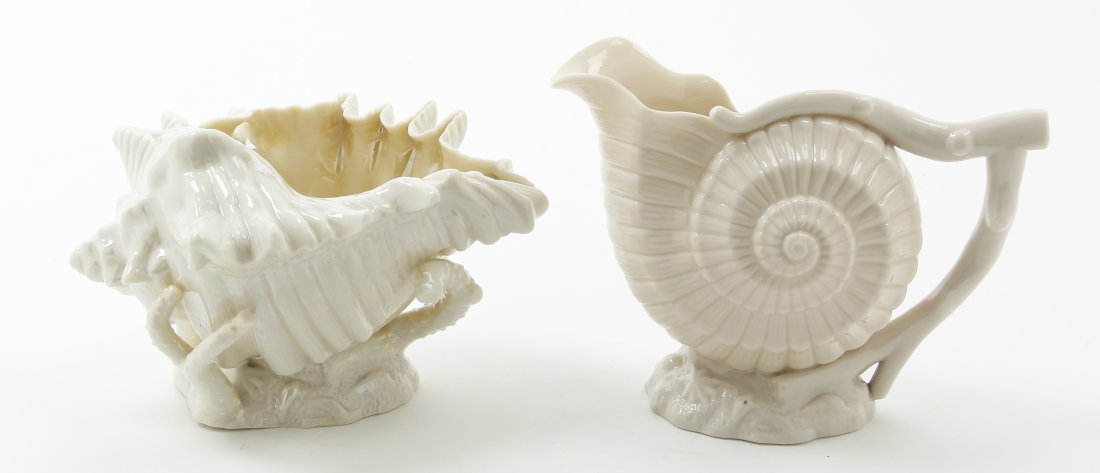A Belleek Creamer and Sugar Set, Height of taller 5: A Belleek Creamer and Sugar Set, each in the form of a shell, one with first Belleek black mark to base, the other with a rubbed black mark. Height of taller 5 inches. Property from a Midwest Family C