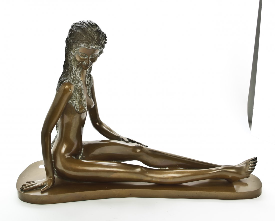 A Romanian Bronze Figure, Prince Monyo: A Romanian Bronze Figure, Prince Monyo Mihailescu-Nasturel (b. 1926), depicting a seated nude, numbered 1/7. Width 30 1/2 inches. Property from the Collection of Ann Gerber, Skokie, Illinois