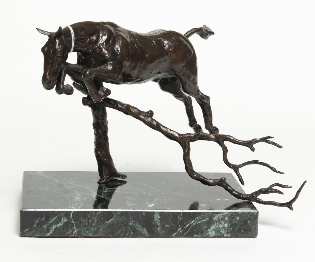 A Contemporary Bronze Horse, Width 9 1/2 inches: A Contemporary Bronze Horse, depicted jumping a fallen branch, set on a marble base, signed indistinctly and numbered 74/250. Width 9 1/2 inches (overall).