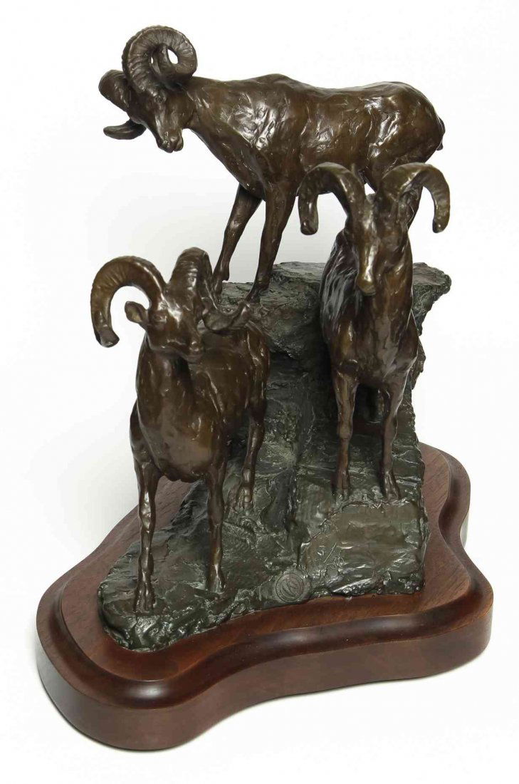 An American Bronze Animalier Group, Franco Vianello: An American Bronze Animalier Group, Franco Vianello (Italian, b. 1937), depicting three big horned sheep standing on a stepped rocky base, further mounted on a wood base, numbered 3/30, stamped Vianel