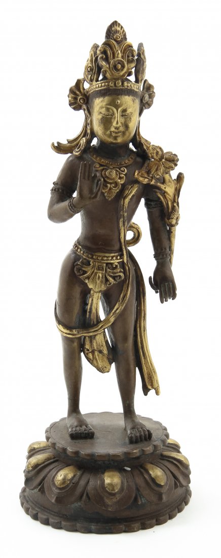 A Bronze Figure of a Buddhist Deity, Height overall 10: A Bronze Figure of a Buddhist Deity, the figure depicted standing, with a gilt painted face, raised on a lotus base. Height overall 10 3/8 inches.