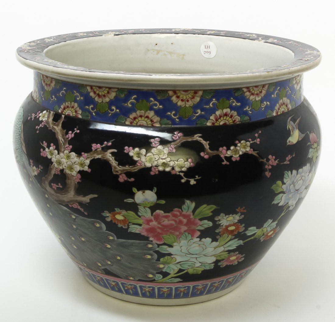A Chinese Famille Noir Jardiniere, Diameter 15 inches.: A Chinese Famille Noir Jardiniere, having floral decoration throughout. Diameter 15 inches. Property from the Collection of Marion P. Church, Chicago, Illinois
