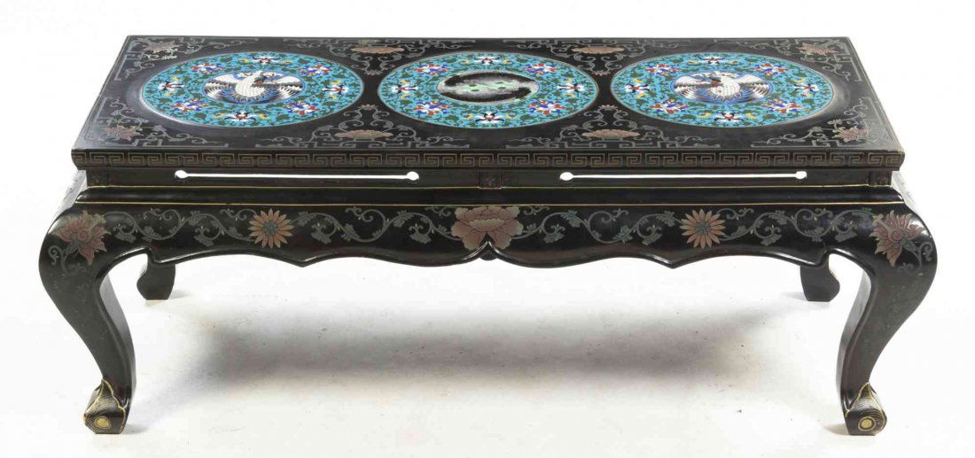 A Chinese Lacquered and Cloisonne Inset Low Table,: A Chinese Lacquered and Cloisonne Inset Low Table, the rectangular top inset with three circular cloisonne plaques, each centered with a bird over the shaped skirt, raised on cabriole legs. Height 18