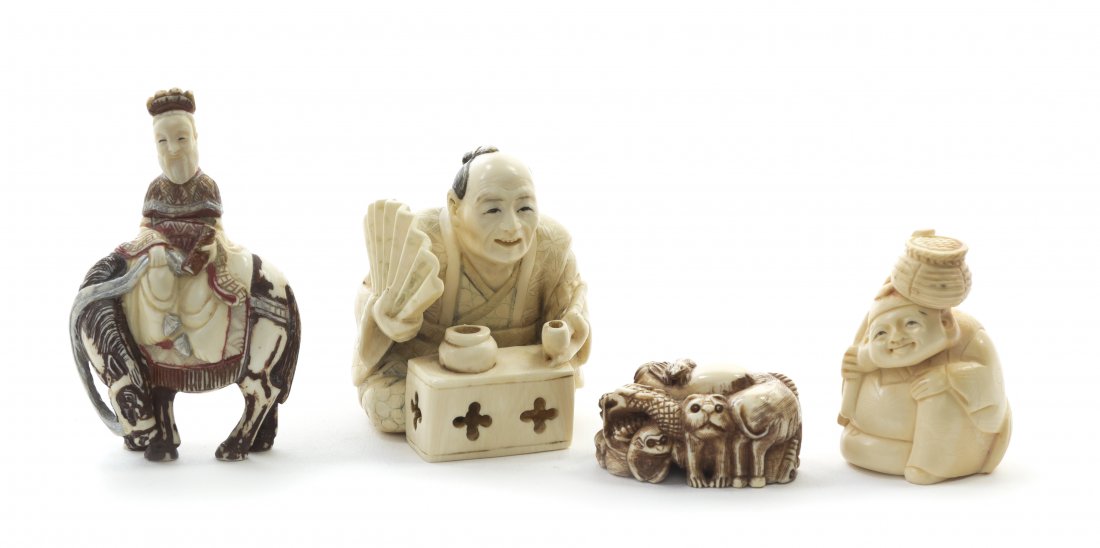 A Group of Four Japanese Carved Ivory Articles, Height: A Group of Four Japanese Carved Ivory Articles, comprising three figural examples and one animal example. Height of tallest 3 1/8 inches. Property from the Estate of William A. Scott, Kansas City, Mis