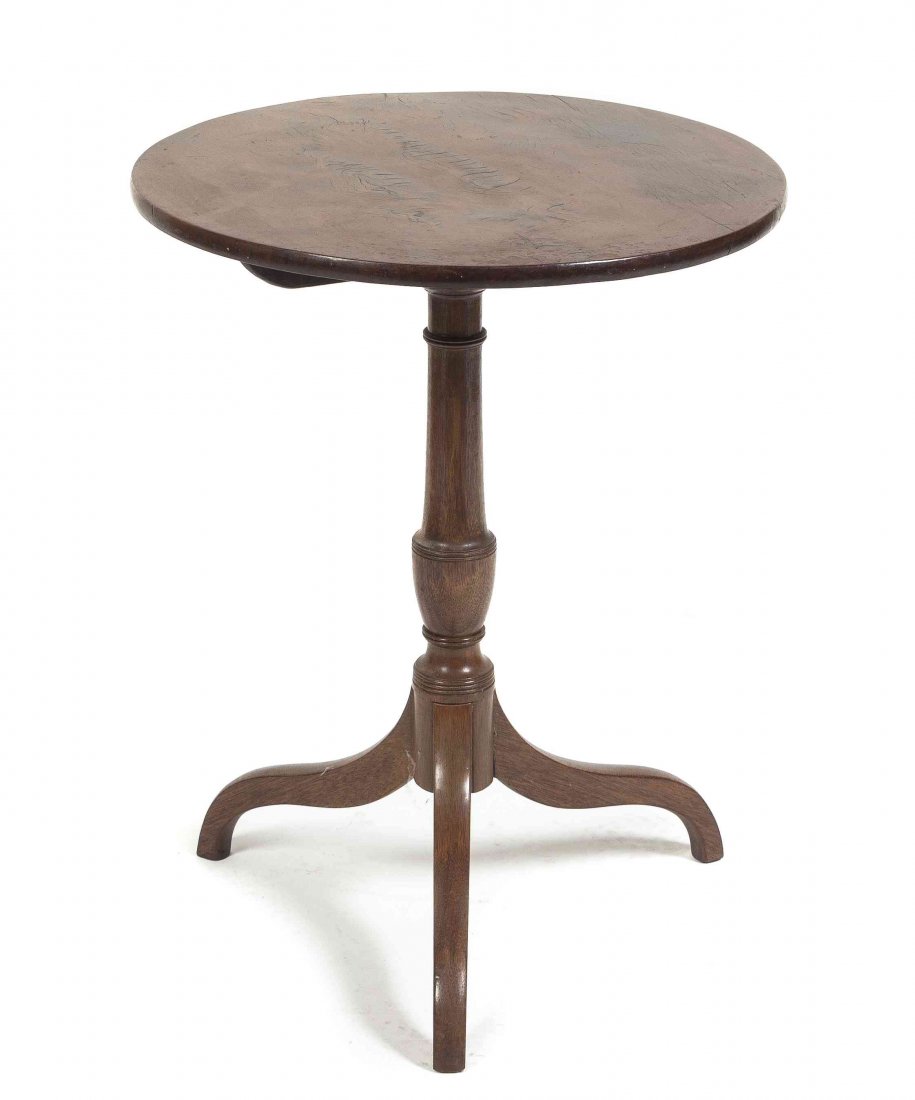 An American Mahogany Jardiniere Stand, Height 28: An American Mahogany Jardiniere Stand, having a circular top raised on a baluster standard over a tripod base. Height 28 inches. Property from the Collection of Lorna Boulton, Chicago, Illinois