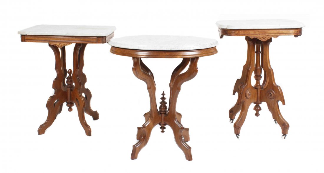 Three Eastlake Side Tables, Height of tallest 29 3/4 x: Three Eastlake Side Tables, each having a white marble top. Height of tallest 29 3/4 x width 22 1/2 x depth 16 3/4 inches. Property from the Estate of Fred and Ilah Plehn, Waukesha, Wisconsin