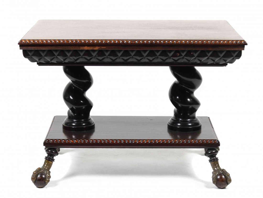 A William IV Style Mahogany Occasional Table, Height 29: A William IV Style Mahogany Occasional Table, having a rectangular top with gadrooned edge above robust twist carved supports on a median shelf, raised on bird claw and ball feet. Height 29 x width 40