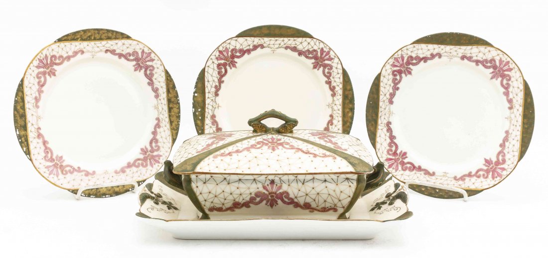 A Limoges Porcelain Partial Dinner Service, Length of: A Limoges Porcelain Partial Dinner Service, comprising 11 dinner plates, a serving platter and a lidded tureen, each with green underglazed H&CO/L mark to underside. Length of serving platter 14 inche