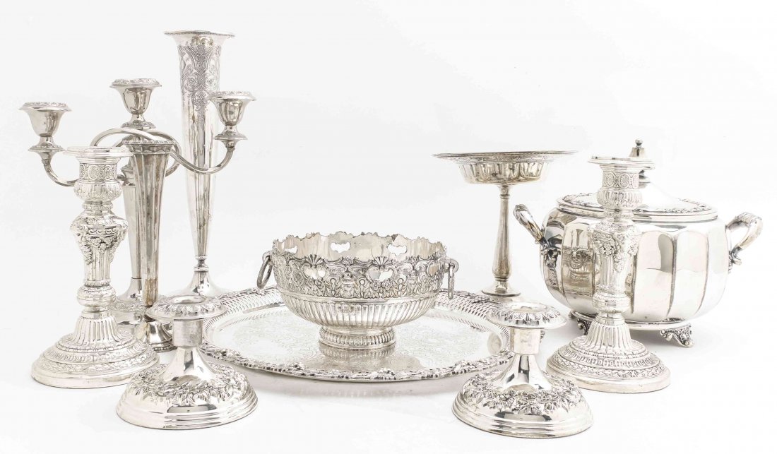 A Collection of Silver-Plate Table Articles, Diameter: A Collection of Silver-Plate Table Articles, comprising two pairs of candlesticks, a candelabrum, two trumpet vases, a compote, a soup tureen, a bowl and a round reticulated tray. Diameter of tray 12 