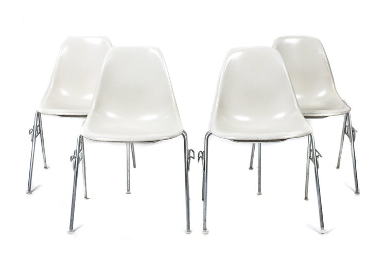 A Group of Four Charles and Ray Eames Chairs, Height 31: A Group of Four Charles and Ray Eames Chairs, each having a molded white fiberglass seat and raised on tubular legs. Height 31 inches. Property from the Collection of the Milwaukee Public Library, Mil