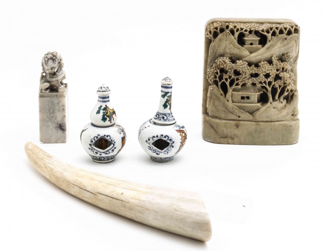 A Collection of Chinese Articles, Height of first: 5: A Collection of Chinese Articles, comprising two soapstone carvings; one of temples in a mountainscape, one a fu dog on a plinth, together with an uncarved tusk and two porcelain painted snuff bottles