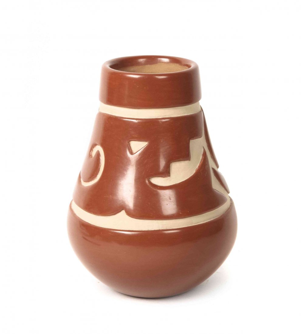 A Santa Clara Redware Pottery Vase, Virginia Ebelacker,: A Santa Clara Redware Pottery Vase, Virginia Ebelacker, having incised decoration, signed Virginia Ebelacker, Santa Clara, Pueblo. Height 7 7/8 x diameter 4 1/2 inches.