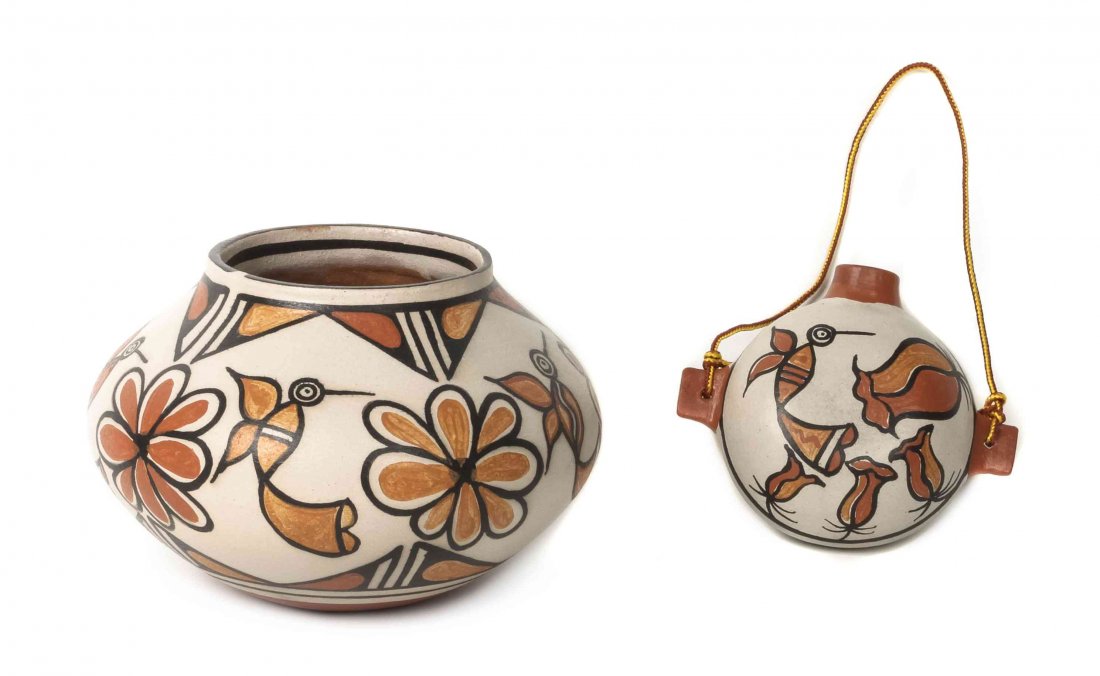 Two Santo Domingo Polychrome Pottery Jars, Rose: Two Santo Domingo Polychrome Pottery Jars, Rose Pocheco, the first having hummingbirds and floral designs, the second decorated in a similar manner, each signed Rose Pocheco, Kewa. Height of larger 6 