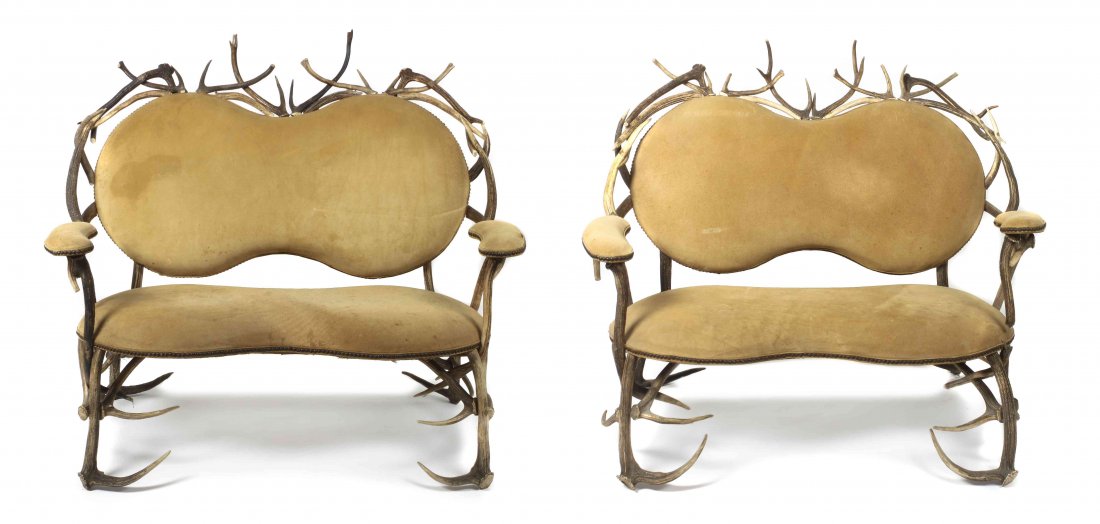 A Pair of American Horn Settees, Height 41 1/4 x width: A Pair of American Horn Settees, having shaped back and seats and upholstered arms. Height 41 1/4 x width 49 x depth 34 inches.