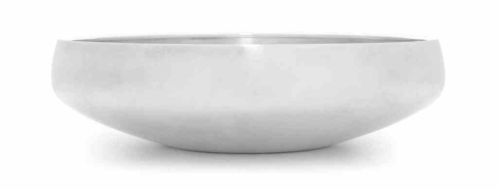 A Danish Silver Bowl, No. 1131B, Georg Jensen: A Danish Silver Bowl, No. 1131B, Georg Jensen Silversmithy, Copenhagen, 1965-77 designed by Henning Koppel in 1965, the shallow circular bowl with tapered sides, with original Jensen box marked on bas