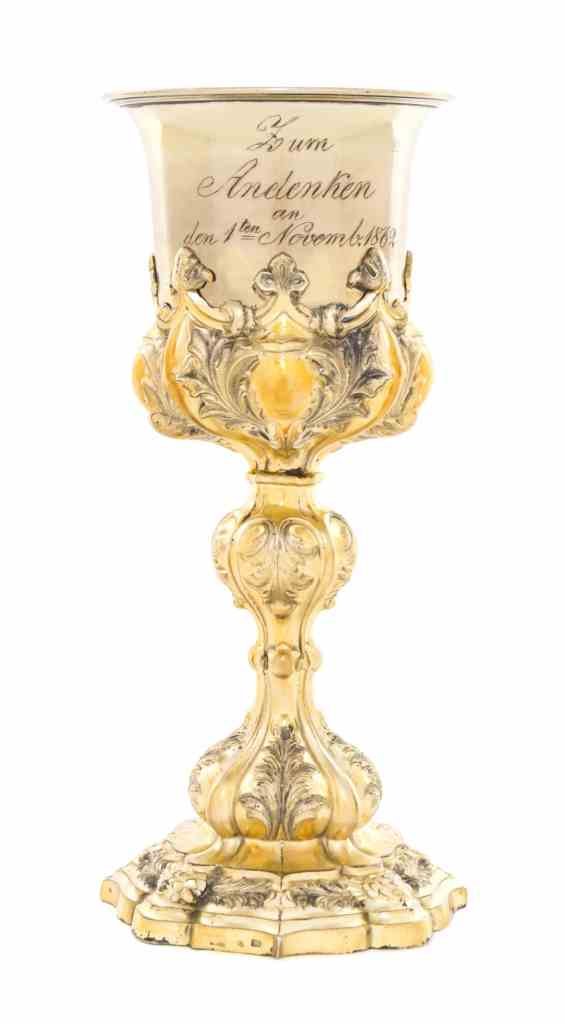 A Continental Parcel-Gilt Silver Chalice, Probably: A Continental Parcel-Gilt Silver Chalice, Probably Austrian, Circa 1860, in 17th century form, with lobed baluster stem and shaped circular base chased with acanthus and stylized flowers, the cup with