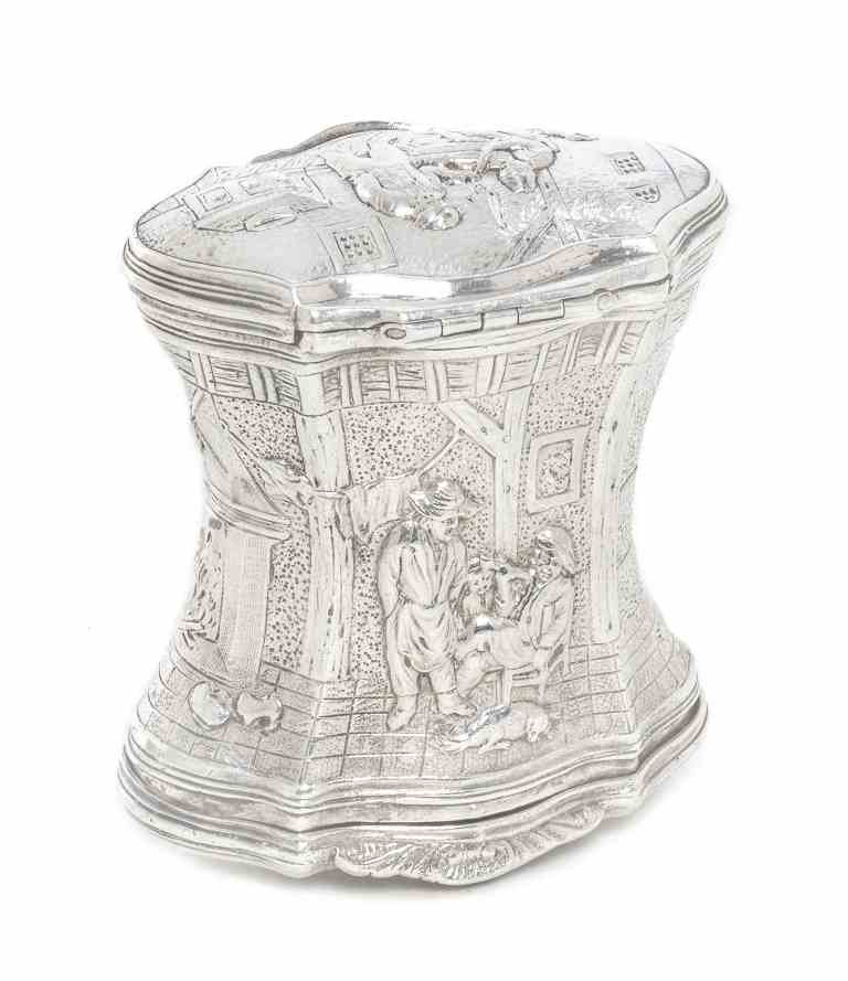 A German Silver Double Snuff Box, Probably Hanau, Late: A German Silver Double Snuff Box, Probably Hanau, Late 19th Century, of spool form, the sides decorated with peasants smoking pipes, drinking and playing music in a 17th century interior, the hinged c