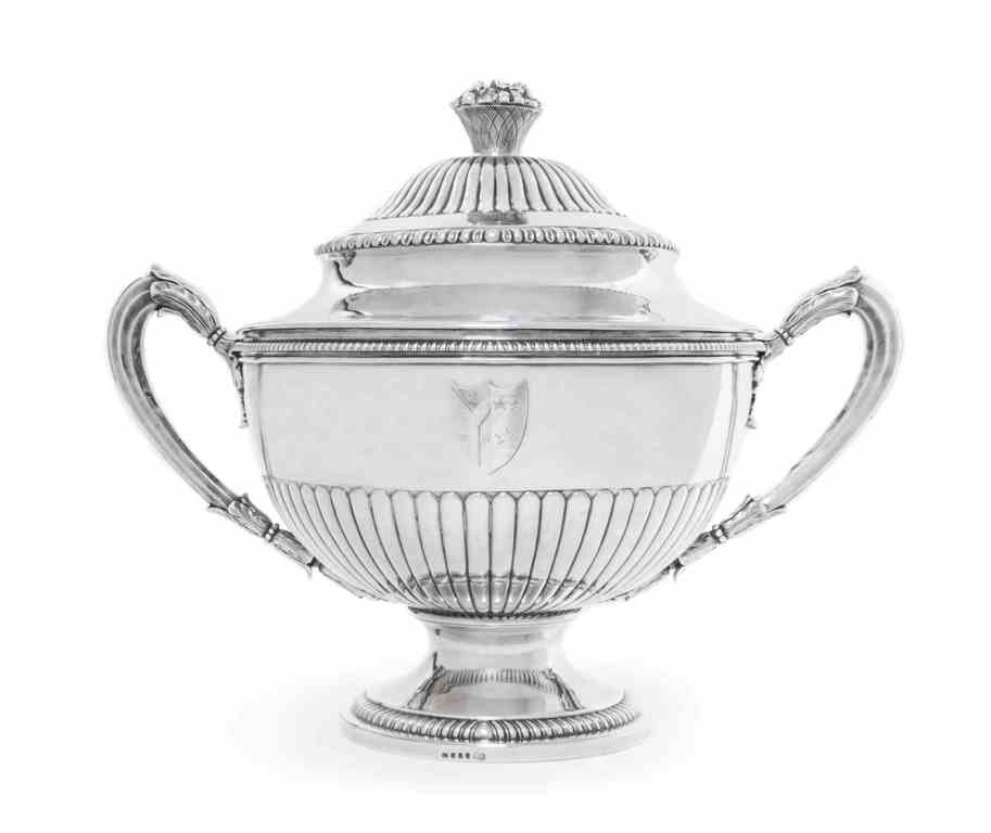 A George III Silver Soup Tureen and Cover, Paul Storr,: A George III Silver Soup Tureen and Cover, Paul Storr, London 1793, circular, with gadrooned lower body and rims, engraved on one side with contemporary arms in a shield, the stepped, partly gadrooned