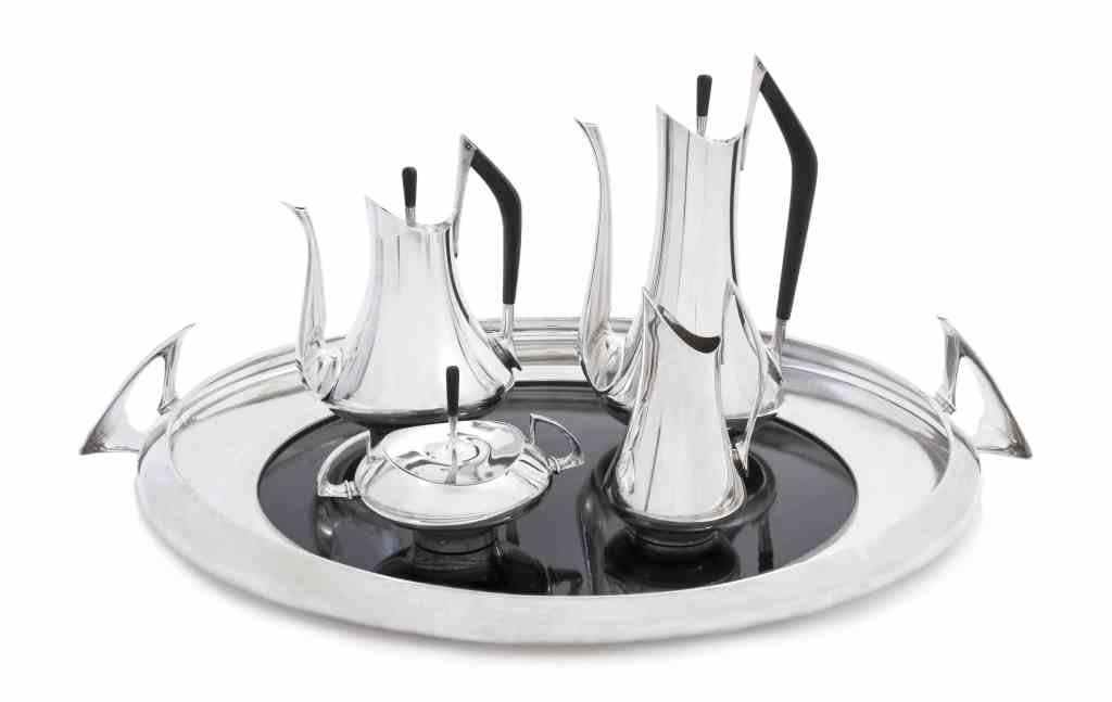 An American Silver Four-Piece Tea and Coffee Set and: An American Silver Four-Piece Tea and Coffee Set and Tray, Donald H. Colflesh for Gorham Mfg. Co., Providence, RI, 1960, circa '70 pattern, designed in 1958, comprising teapot, coffee pot, creamer, co