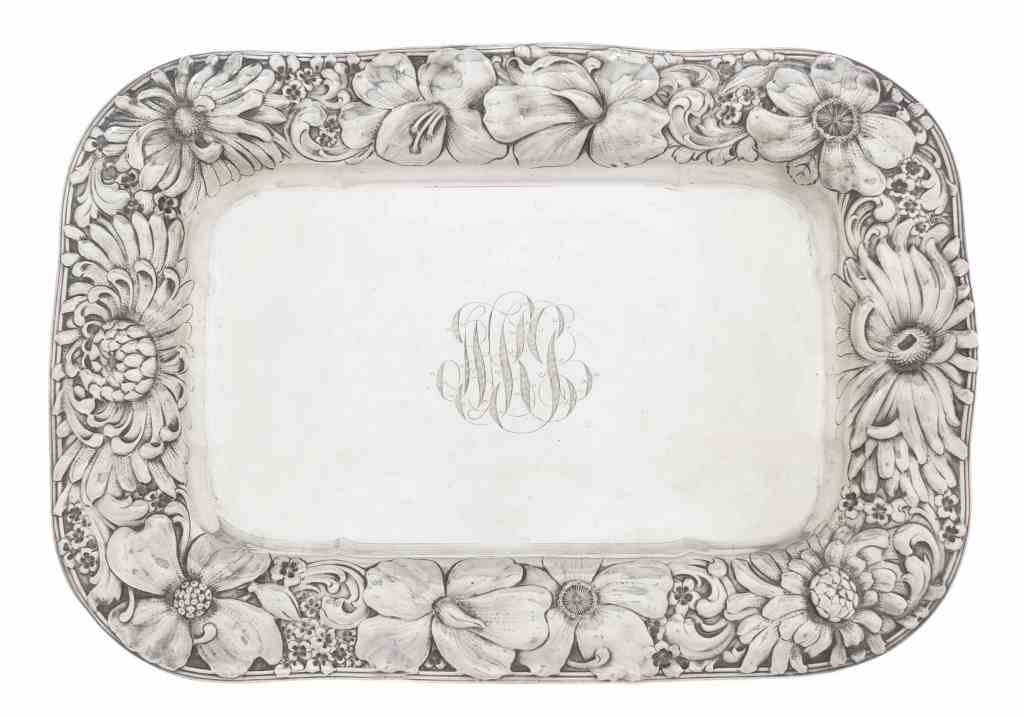 An American Silver Rectangular Tray, Gorham Mfg. Co.,: An American Silver Rectangular Tray, Gorham Mfg. Co., Providence, RI, 1902, the wide border embossed and chased with dense flowers including chrysanthemum, prunus and iris, center engraved with script