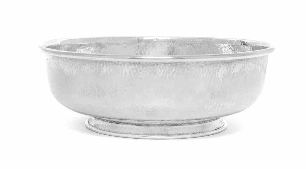 An American Silver Bowl, J.M. Merrill, New York, NY,: An American Silver Bowl, J.M. Merrill, New York, NY, Circa 1910, of low circular form on short spreading foot, spot-hammered surface, marked on base and numbered 2007A; 13 ozt 8 dwt. Diameter 8 3/8 in