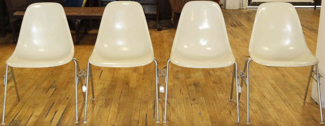 A Group of Six Charles and Ray Eames Chairs, Height 31: A Group of Six Charles and Ray Eames Chairs, white and raised on tubular legs. Height 31 inches. Property from the Collection of the Milwaukee Public Library, Milwaukee Wisconsin