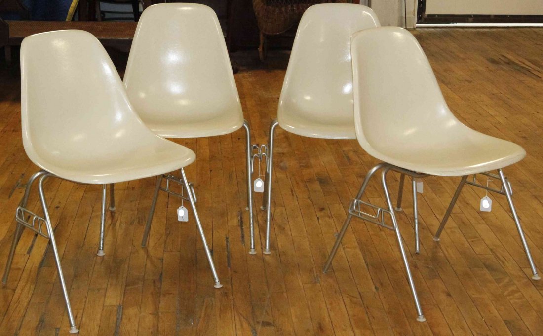 A Group of Eight Charles and Ray Eames Chairs, Height: A Group of Eight Charles and Ray Eames Chairs, white and raised on tubular legs. Height 31 inches. Property from the Collection of the Milwaukee Public Library, Milwaukee Wisconsin