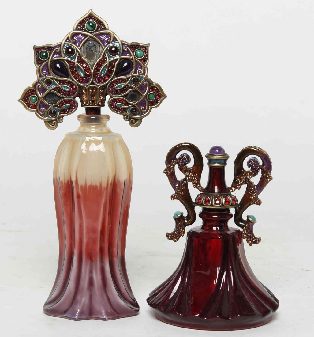 Two Jay Strongwater Perfume Bottles, Height of tallest: Two Jay Strongwater Perfume Bottles, each of varying form with an enameled stopper. Height of tallest 7 1/2 inches. Property from the Estate of Louis M. and Linda M. Byron, Tucson, Arizona