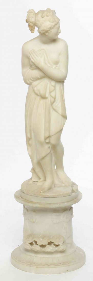 A Continental Alabaster Figure, Height 18 1/2 inches: A Continental Alabaster Figure, depicting Venus after her bath, with a columnar base. Height 18 1/2 inches (overall).