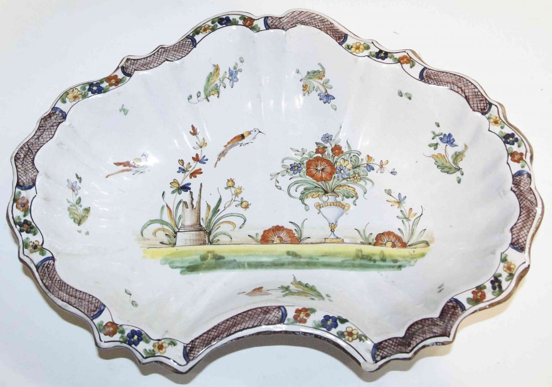 An Italian Faience Bowl, Width 13 inches.: An Italian Faience Bowl, having bird and foliate decoration, unmarked. Width 13 inches.