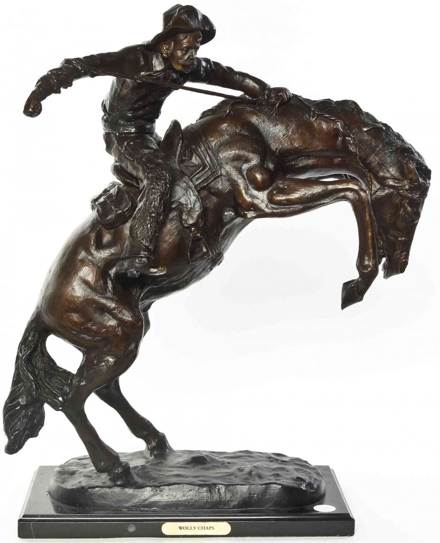 An American Bronze Figural Group, after Frederic: An American Bronze Figural Group, after Frederic Sackrider Remington (1861-1909), Wooly Chaps, originally cast in 1903, depicting a cowboy on a rearing horse. Height 22 1/2 inches. Property from the C