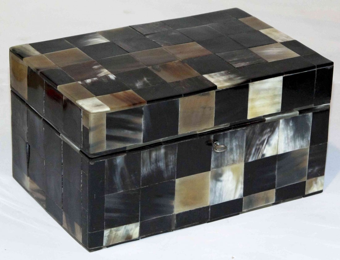 A Horn Veneered Table Casket, Width 9 1/4 inches.: A Horn Veneered Table Casket, of rectangular form with alternating square inlays. Width 9 1/4 inches.